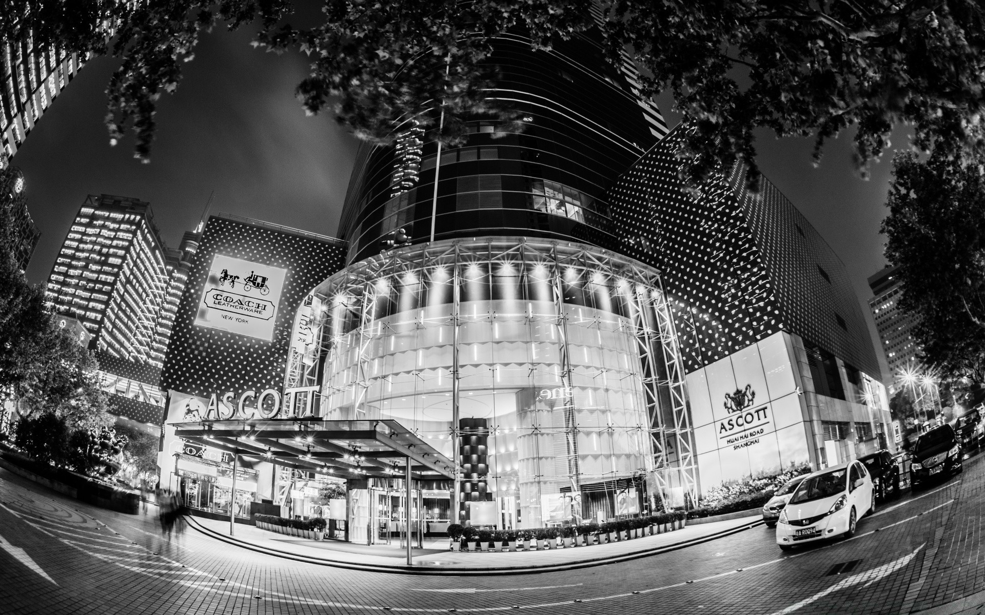 black and white architecture city building street travel modern skyscraper urban light transportation system downtown monochrome cityscape sky outdoors hotel tower skyline road