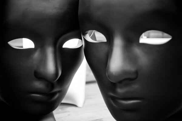 Gesichtsmasken Männer und Frauen Schwarz-Weiß-Fotos
