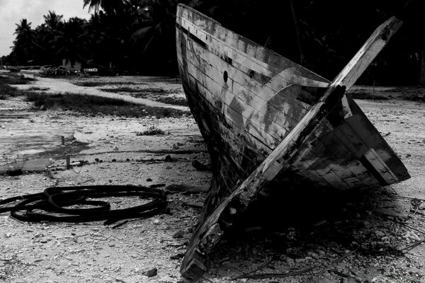 Abandoned wreckage on the shore