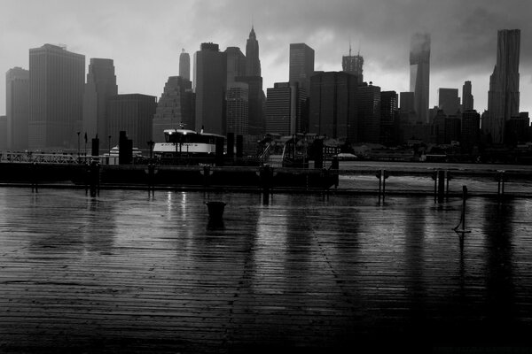 Black and white photo of the city landscape with skyscrapers