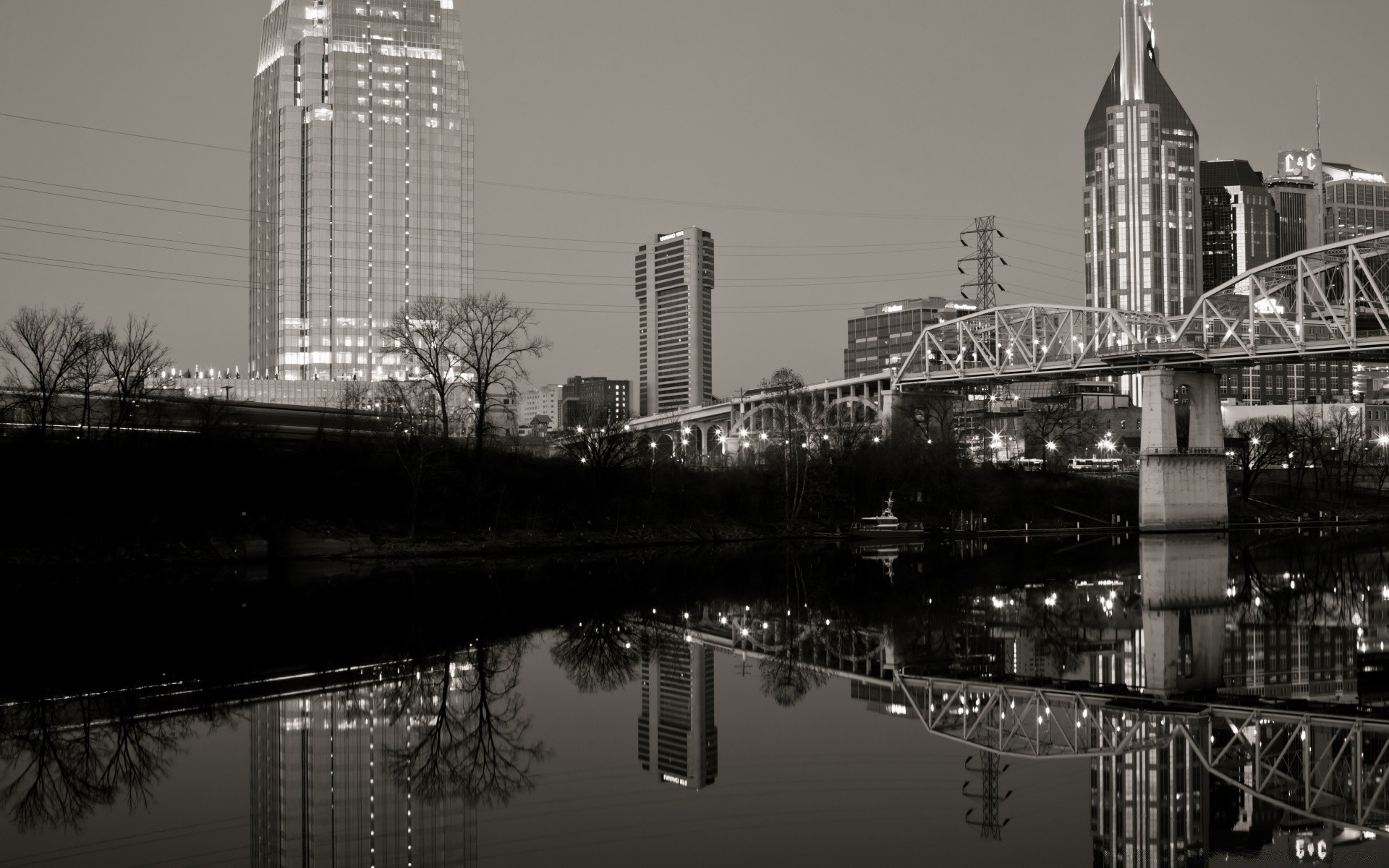 schwarz/weiß stadt architektur fluss brücke haus skyline stadt wasser reflexion städtisch wolkenkratzer turm reisen modern himmel büro monochrom geschäftlich innenstadt