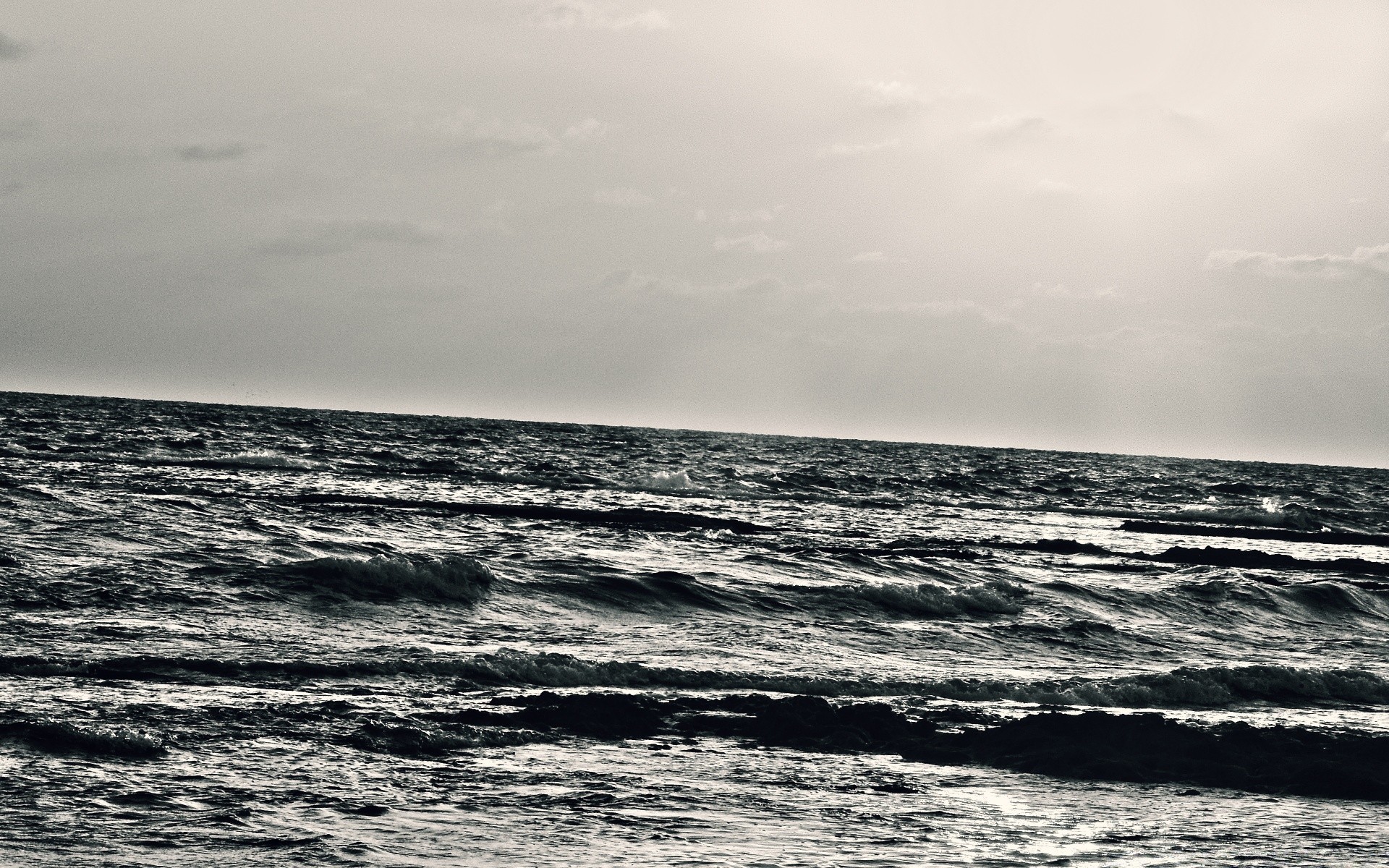 black and white sea ocean beach water seascape landscape storm nature sky wave seashore sunset surf sand