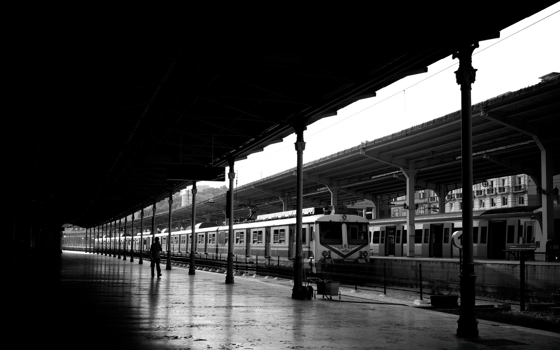 black and white monochrome architecture tube street city bridge travel light transportation system train urban dark building railway reflection shadow