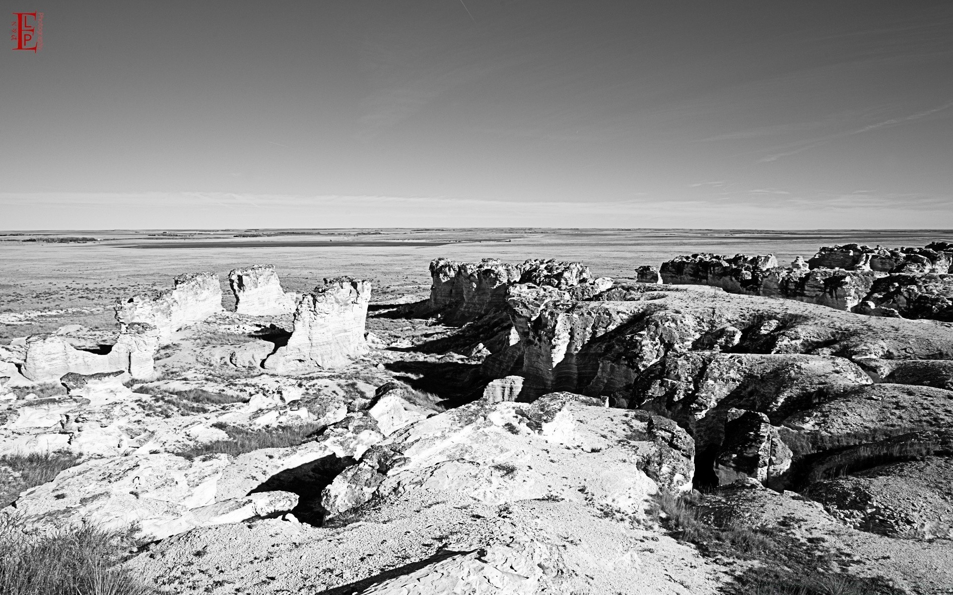 black and white seashore sea beach landscape rock ocean water sky nature outdoors travel scenic seascape