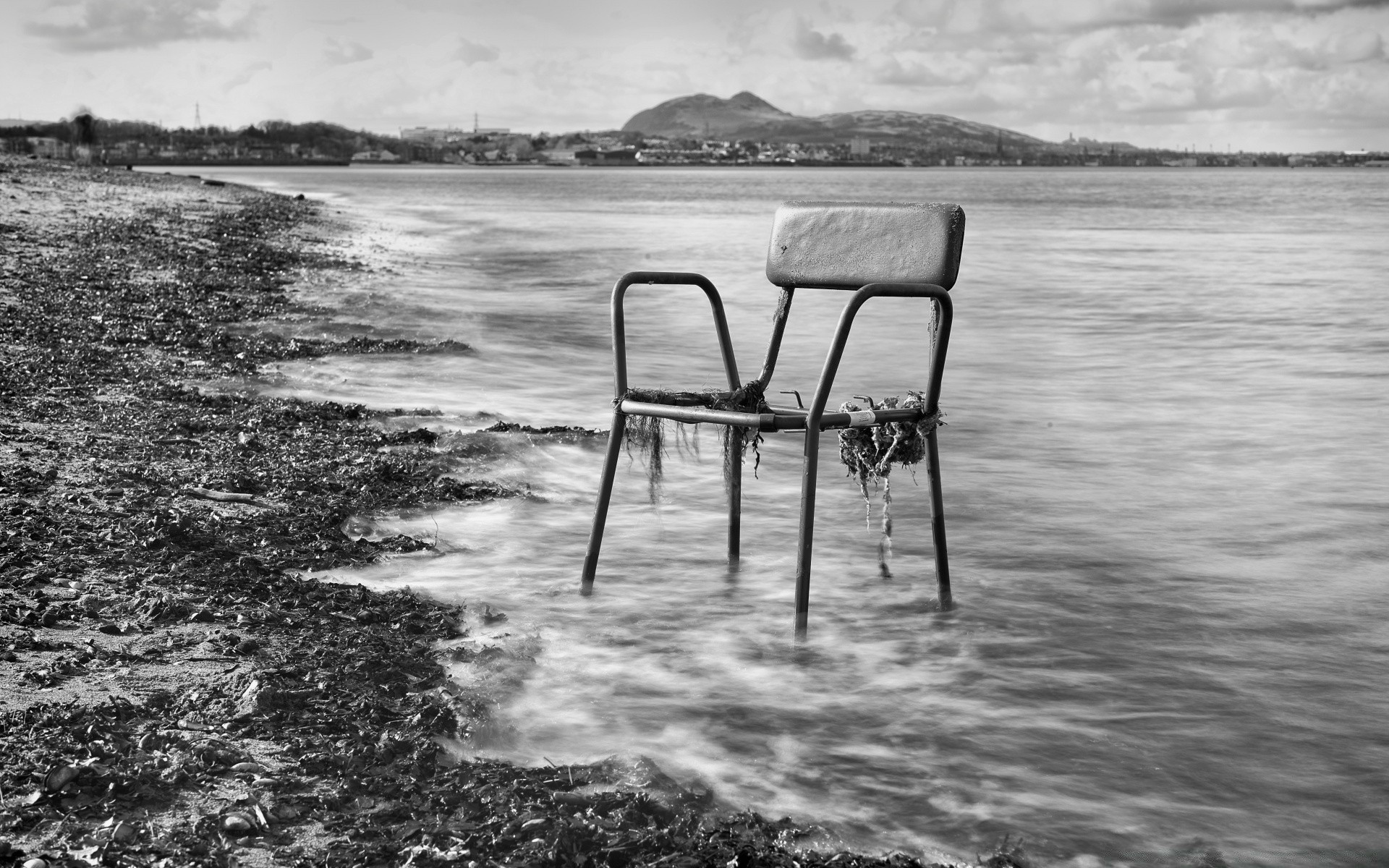 black and white water outdoors sea beach seashore ocean chair lake travel nature