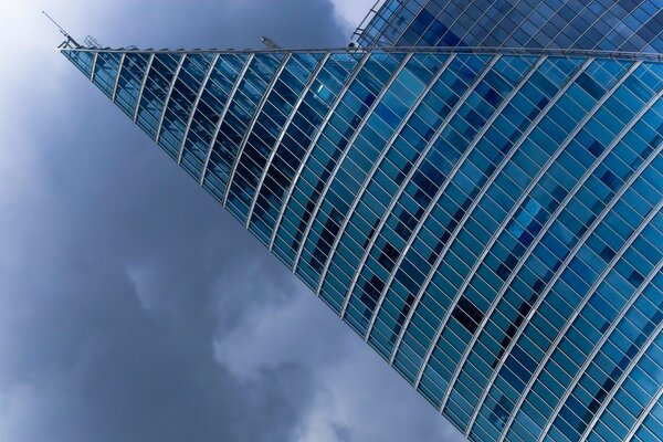 Multi-storey office center in cloudy weather