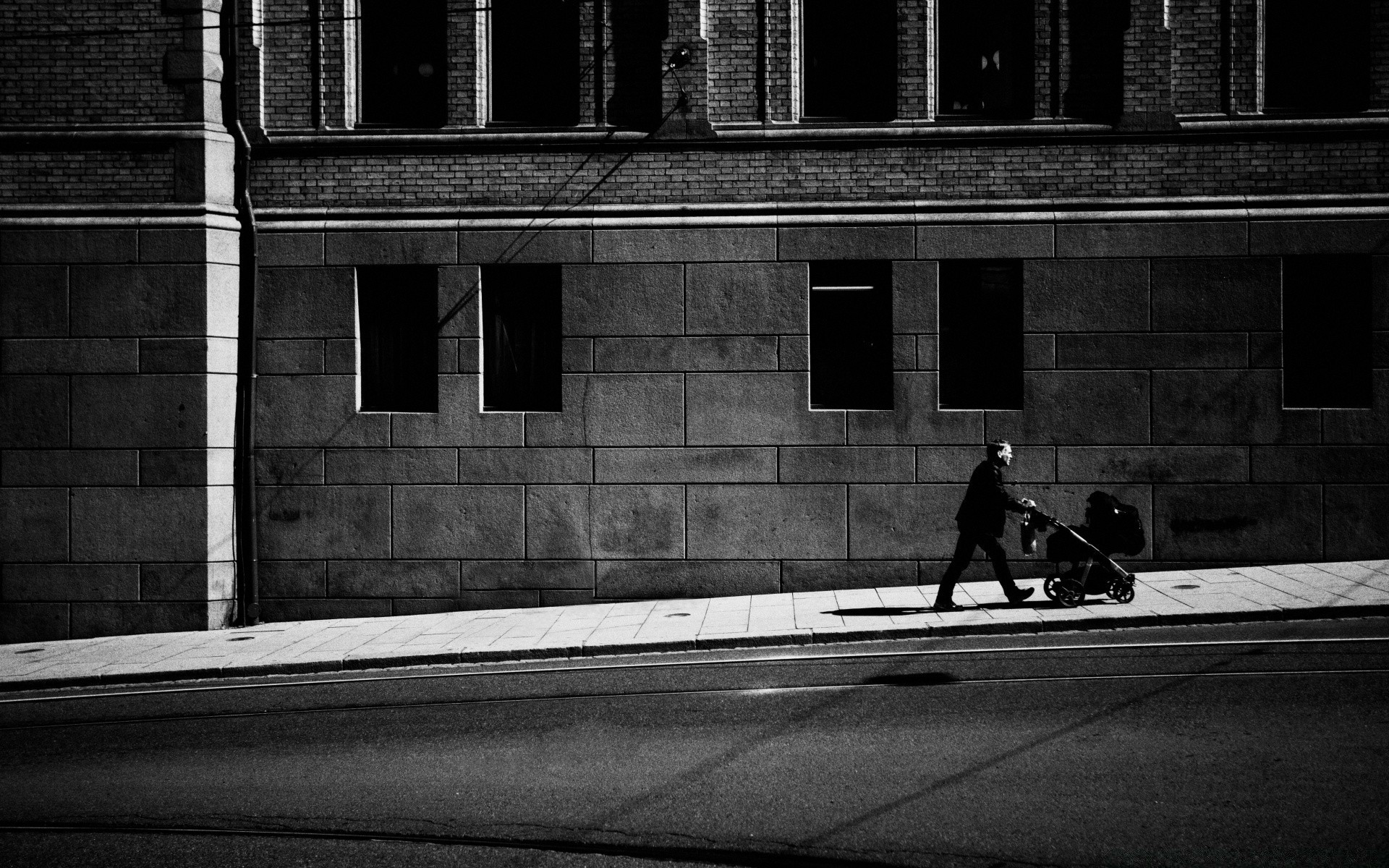 black and white monochrome street adult group one transportation system man shadow city architecture vehicle