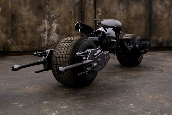 A motorcycle from the future with wide tires