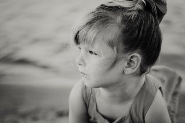 A little girl in a light dress