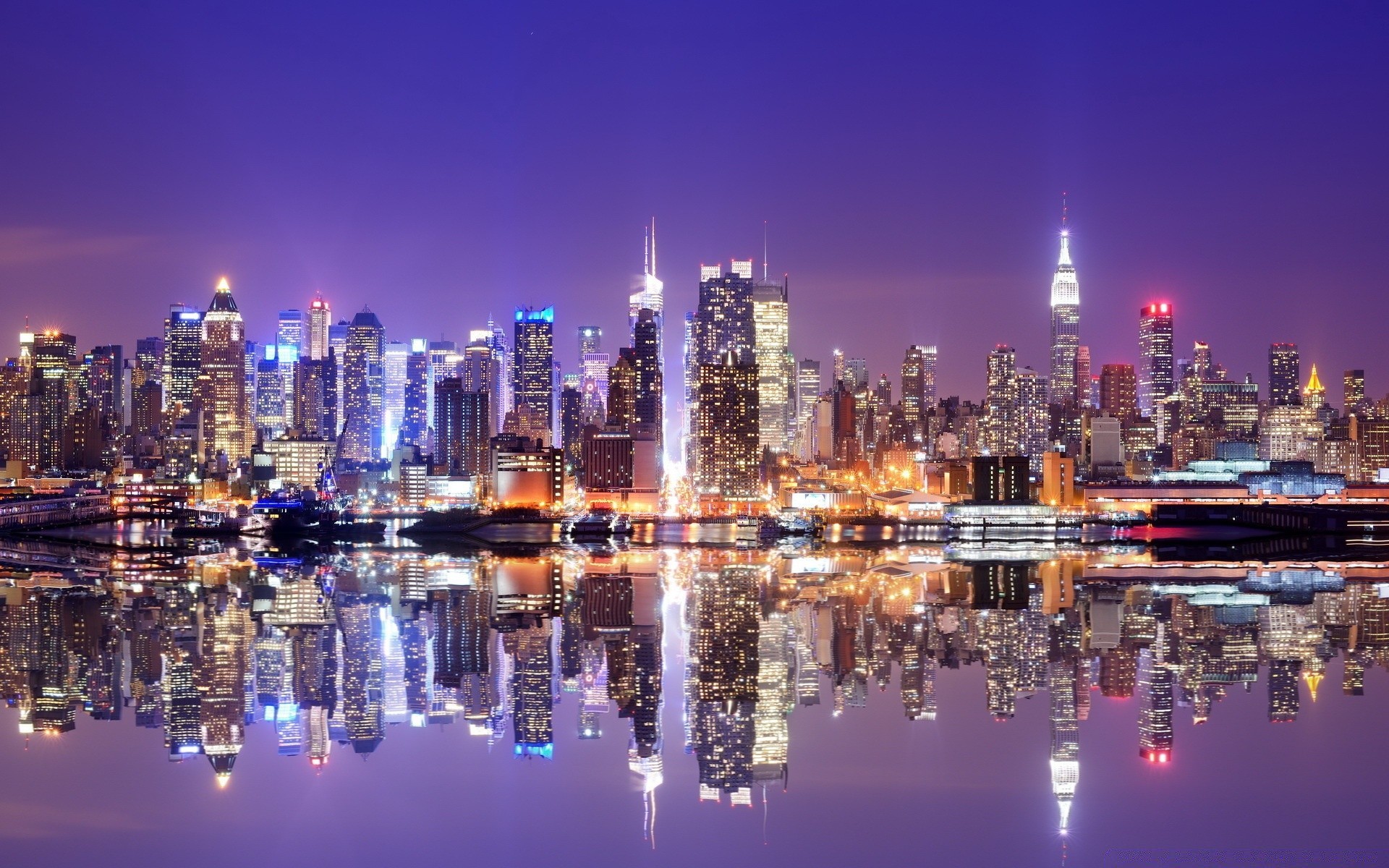 other city downtown cityscape skyline city skyscraper architecture dusk illuminated business modern office evening sky reflection building tower urban travel finance water