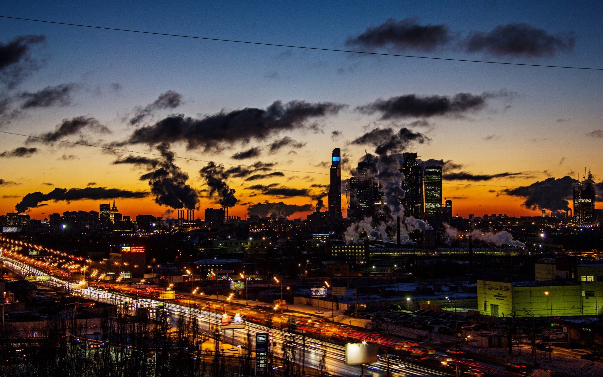 other city city travel urban building cityscape sky dusk evening sunset architecture skyline bridge street traffic downtown sight light road town river