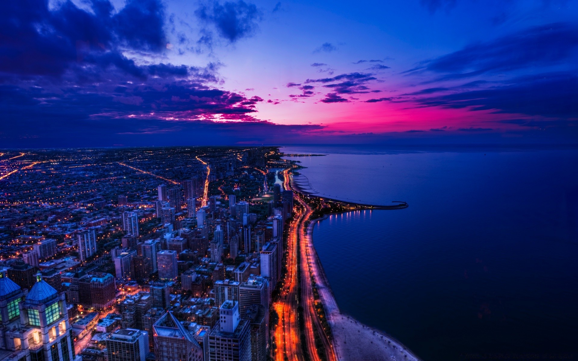 other city city travel water evening sunset architecture dusk cityscape skyline sky building urban sea dawn river