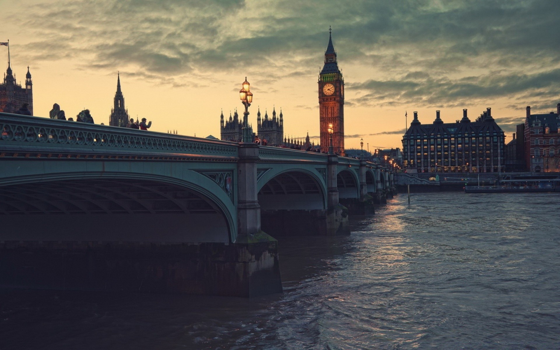 other city bridge architecture river travel building water city evening dusk sky sunset outdoors landmark tower castle tourism urban