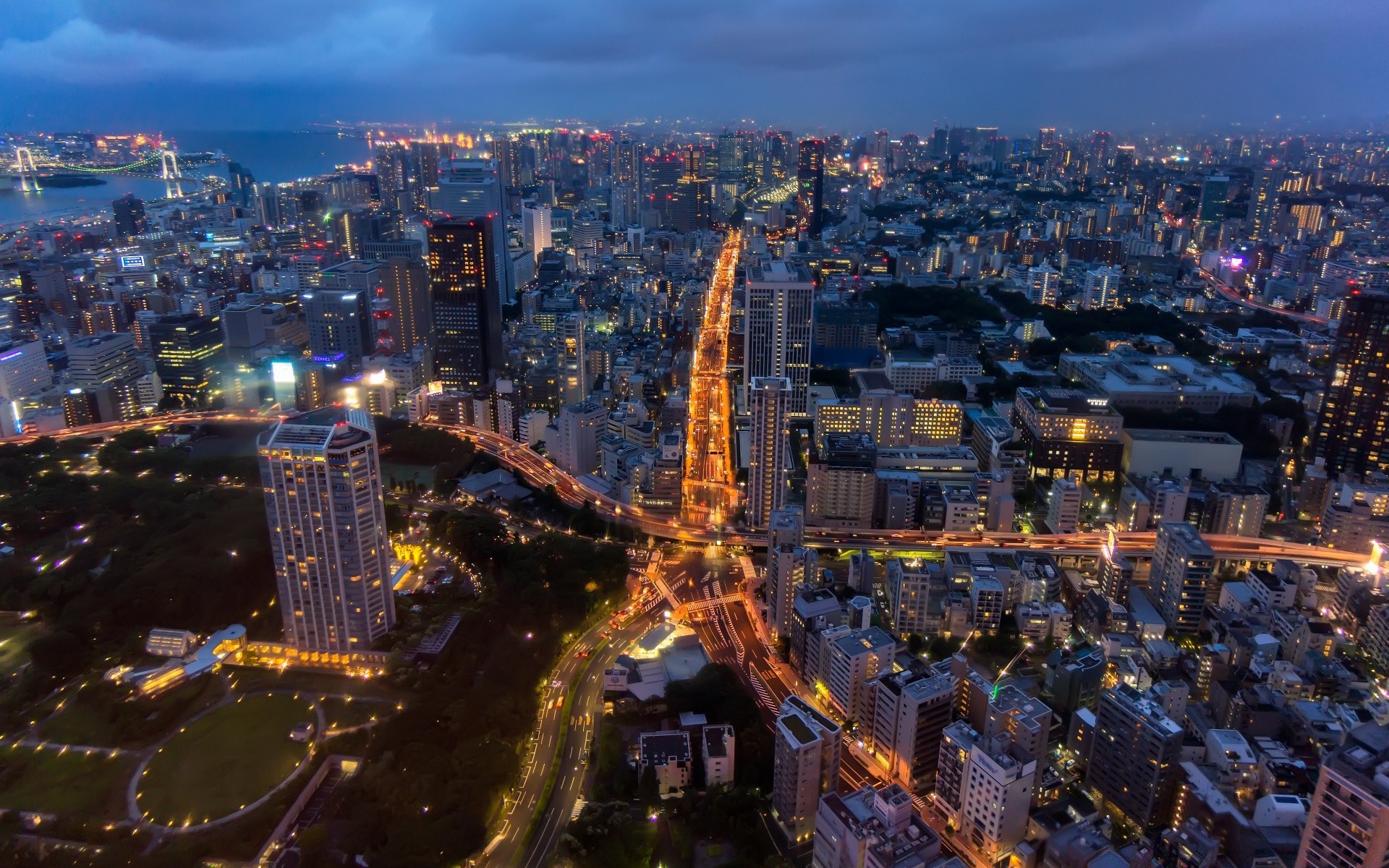 other city city cityscape travel skyline urban dusk evening building skyscraper architecture traffic aerial downtown business bridge road light river water