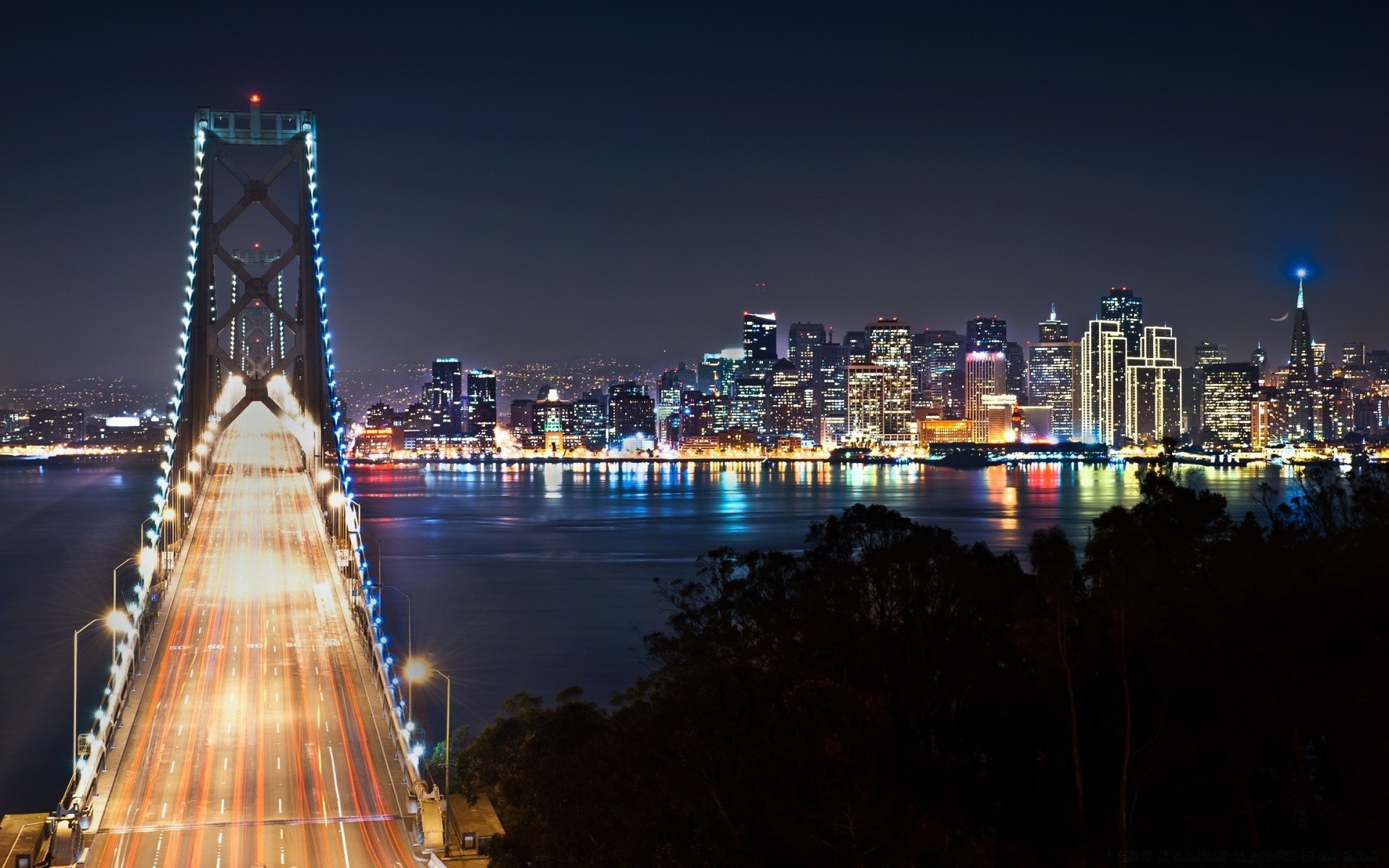 outras cidades cidade ponte viagens arquitetura cidade água skyline crepúsculo noite rio arranha-céu casa urbano céu pôr do sol ponto de interesse iluminado reflexão centro da cidade