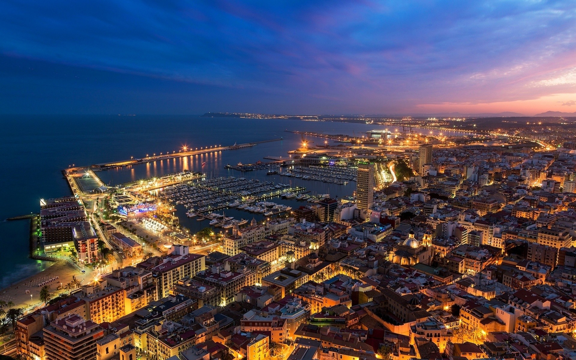 otras ciudades ciudad ciudad arquitectura viajes skyline crepúsculo puesta de sol noche hogar urbano cielo panorámico espectáculo ciudad punto de referencia al aire libre centro de la ciudad agua rascacielos