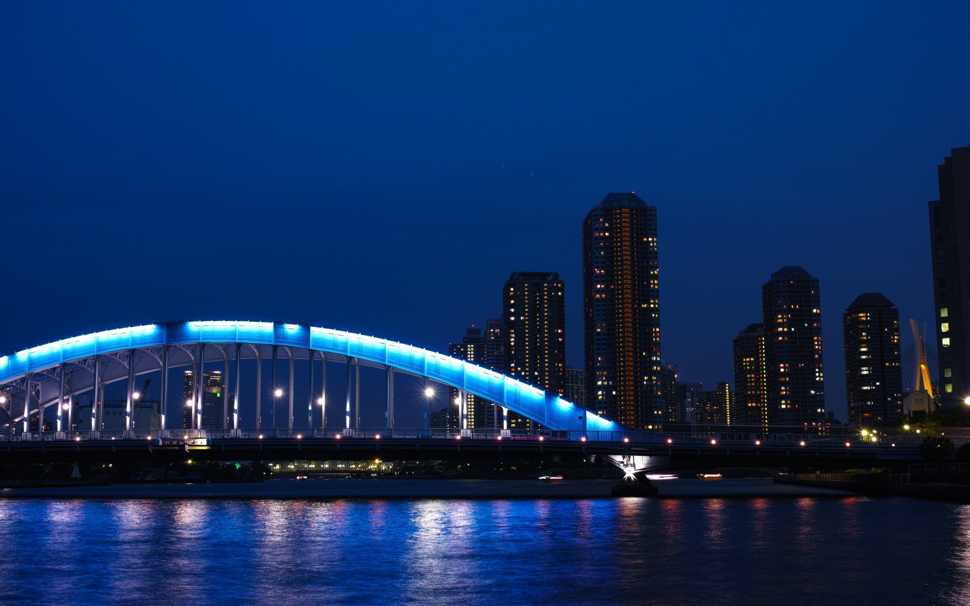 other city architecture city bridge travel dusk water downtown sky cityscape evening skyline building river urban sunset business illuminated skyscraper finance