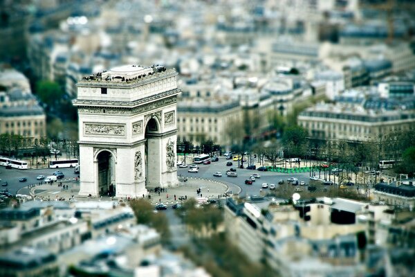 The building is in the form of a white arch