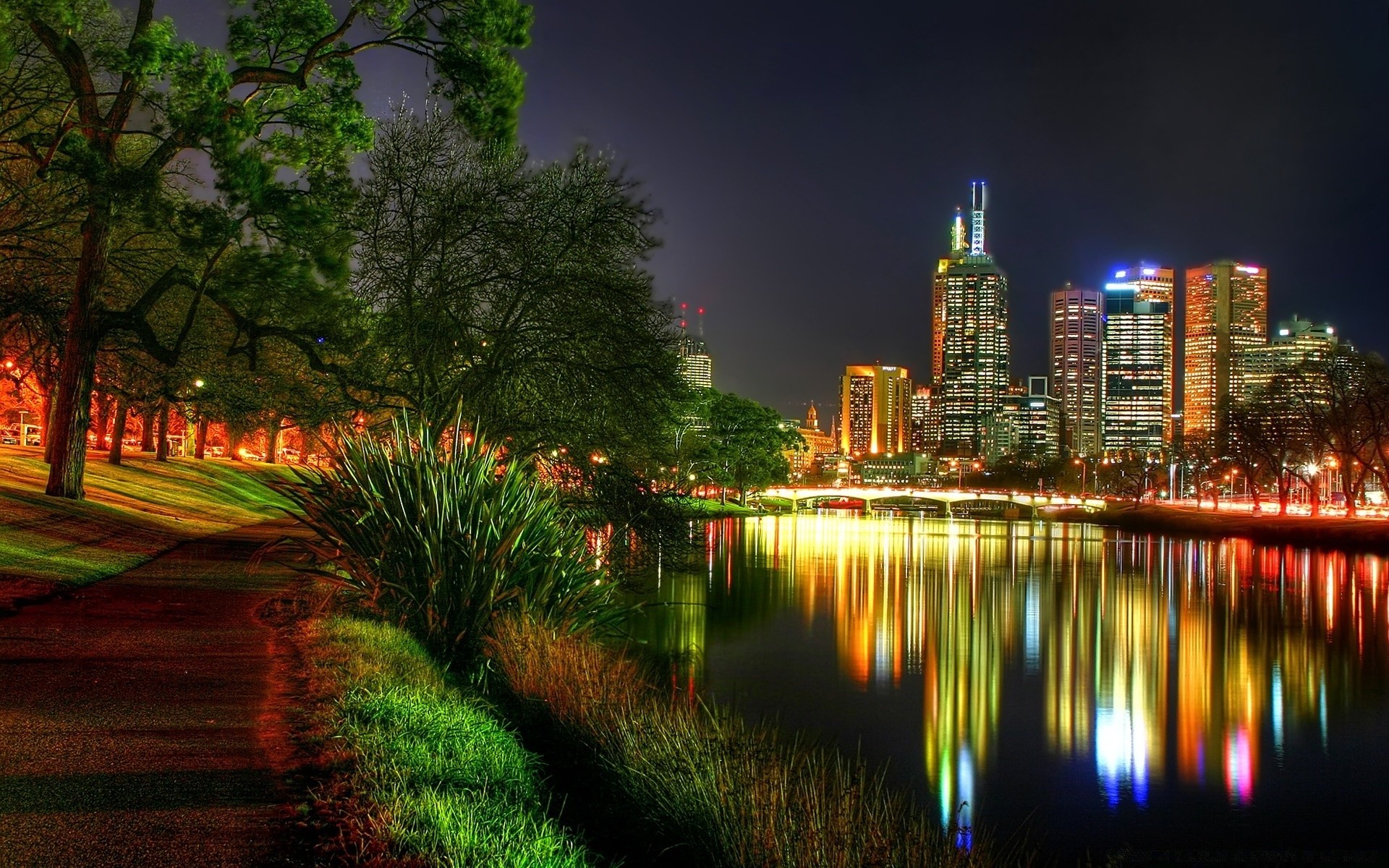 other city city architecture travel building water cityscape evening river skyline sky dusk downtown bridge urban reflection skyscraper outdoors sunset light