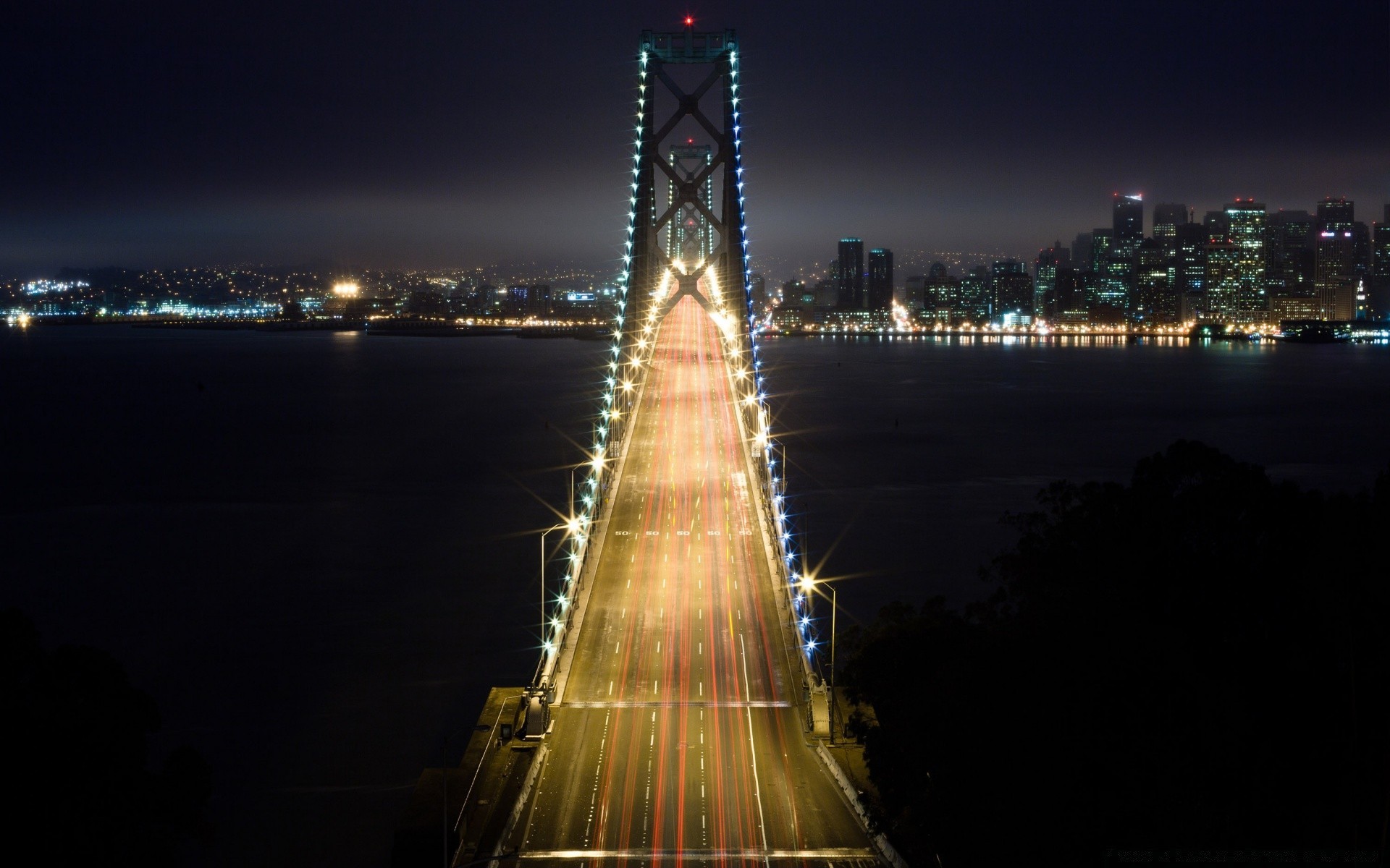 other city bridge water city architecture river travel sky dusk sunset cityscape evening skyline tower downtown building skyscraper reflection urban landmark