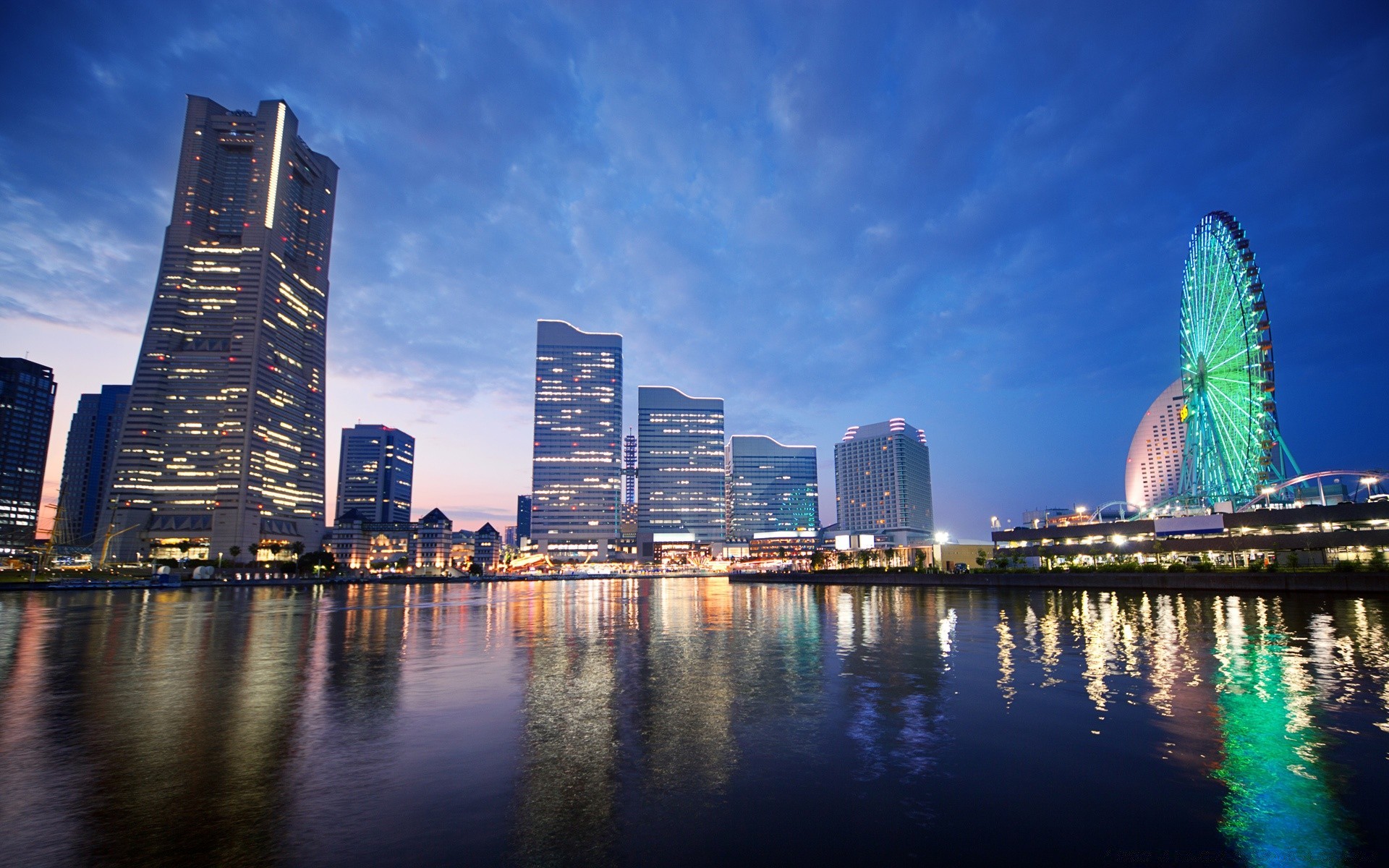 other city architecture city skyline skyscraper cityscape sky downtown office travel building water reflection dusk sunset urban evening modern river tower