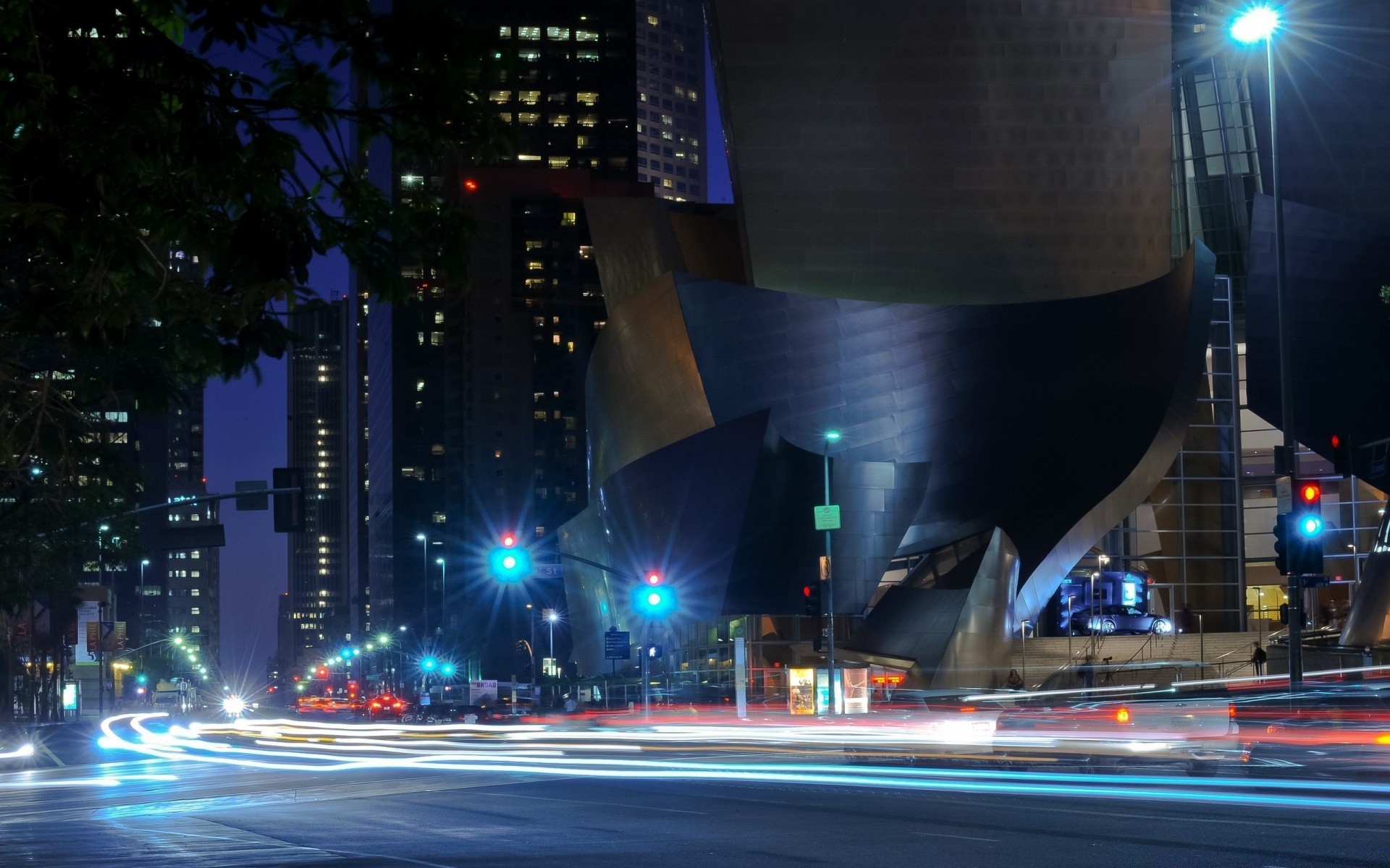 other city traffic road downtown blur evening street skyscraper transportation system city car highway building light bus dusk fast urban travel architecture illuminated