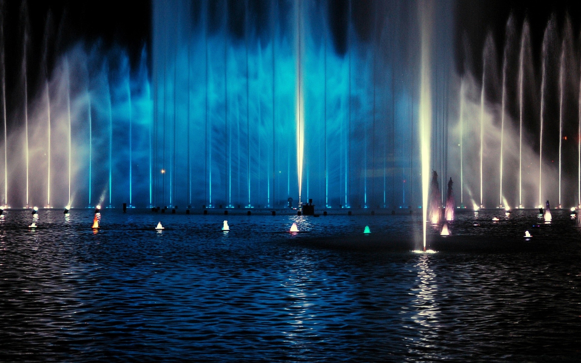 other city fountain motion evening city water light energy music sky architecture river performance building reflection rainbow illuminated travel