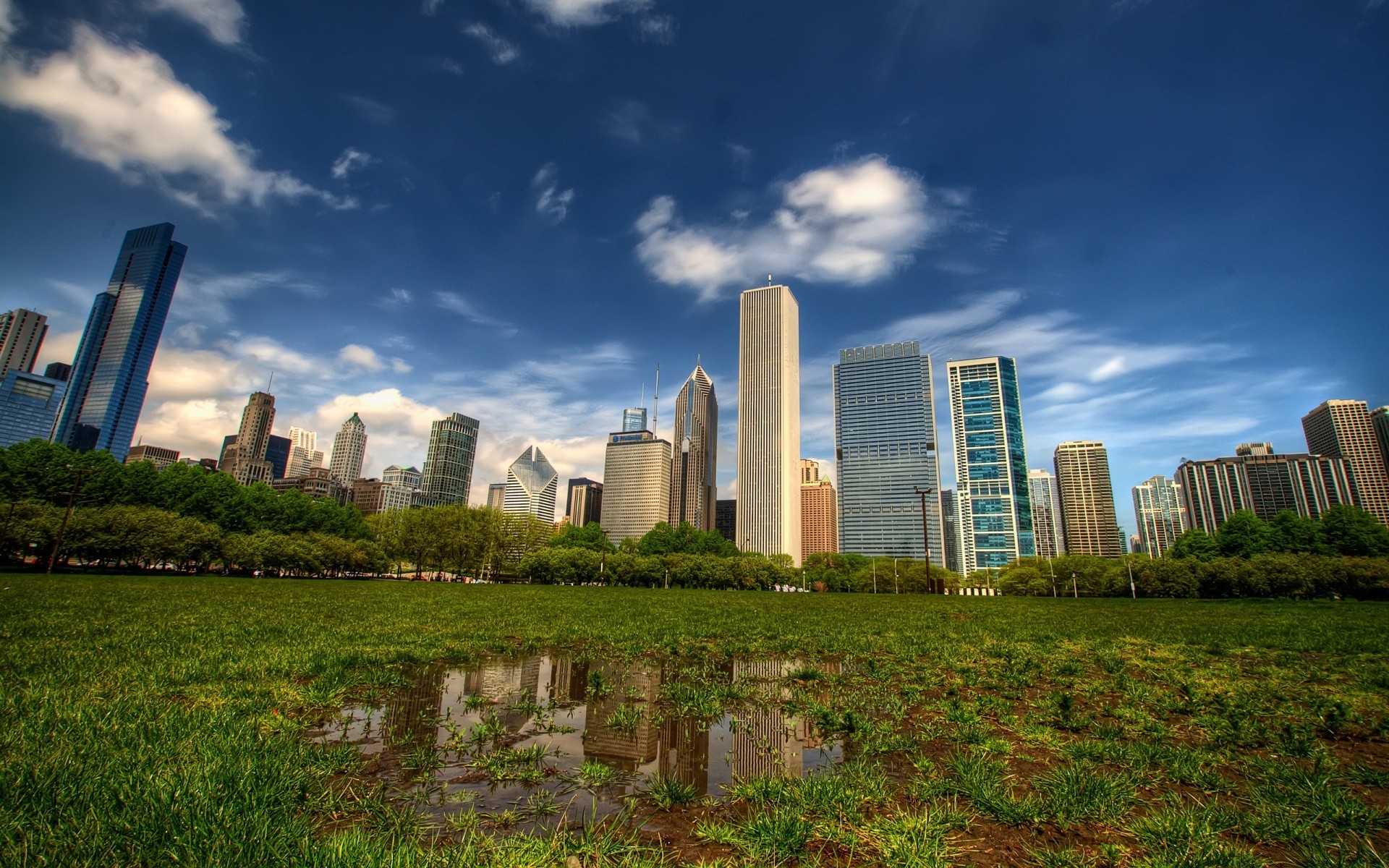 other city architecture sky city building outdoors travel daylight tower grass skyline skyscraper