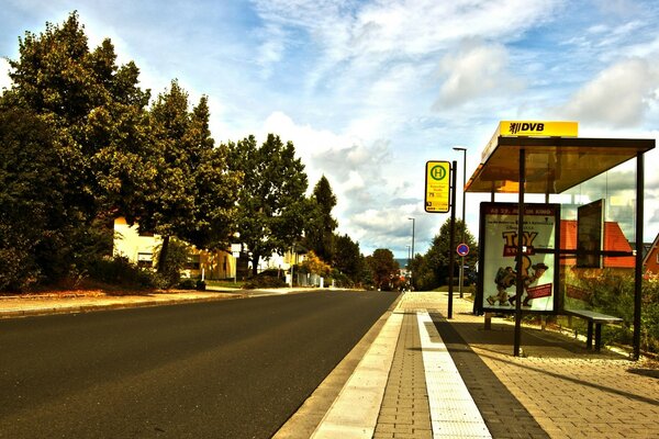 Deserted bus stop near the forest