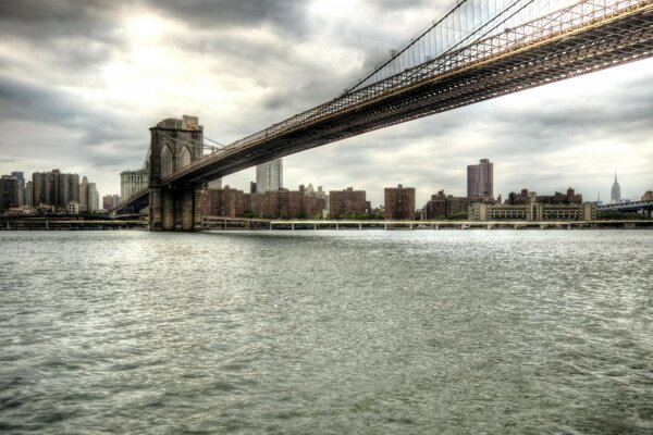 The architecture of the city. Bridge over the river