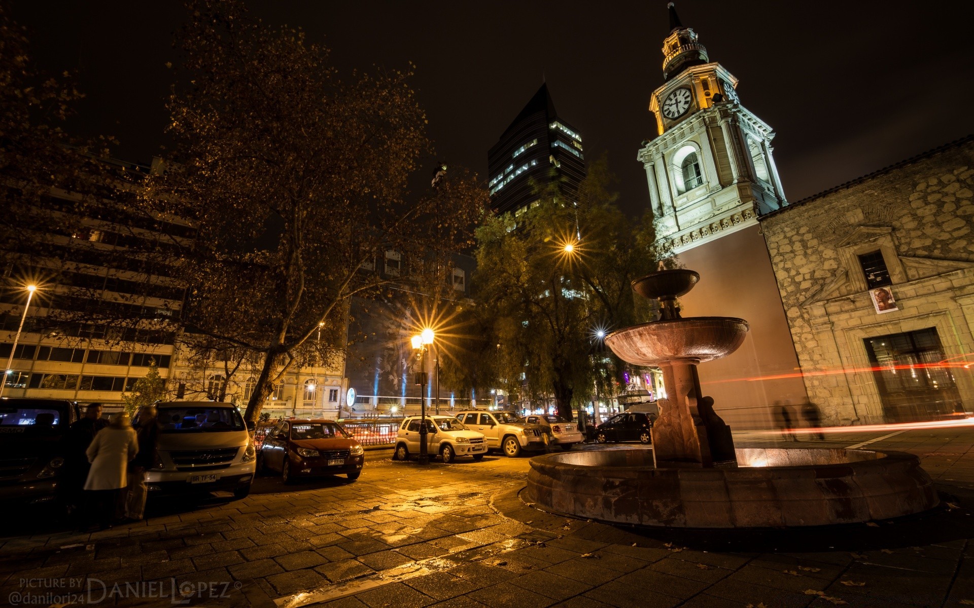 other city street city light travel building road architecture car evening illuminated urban dark dusk