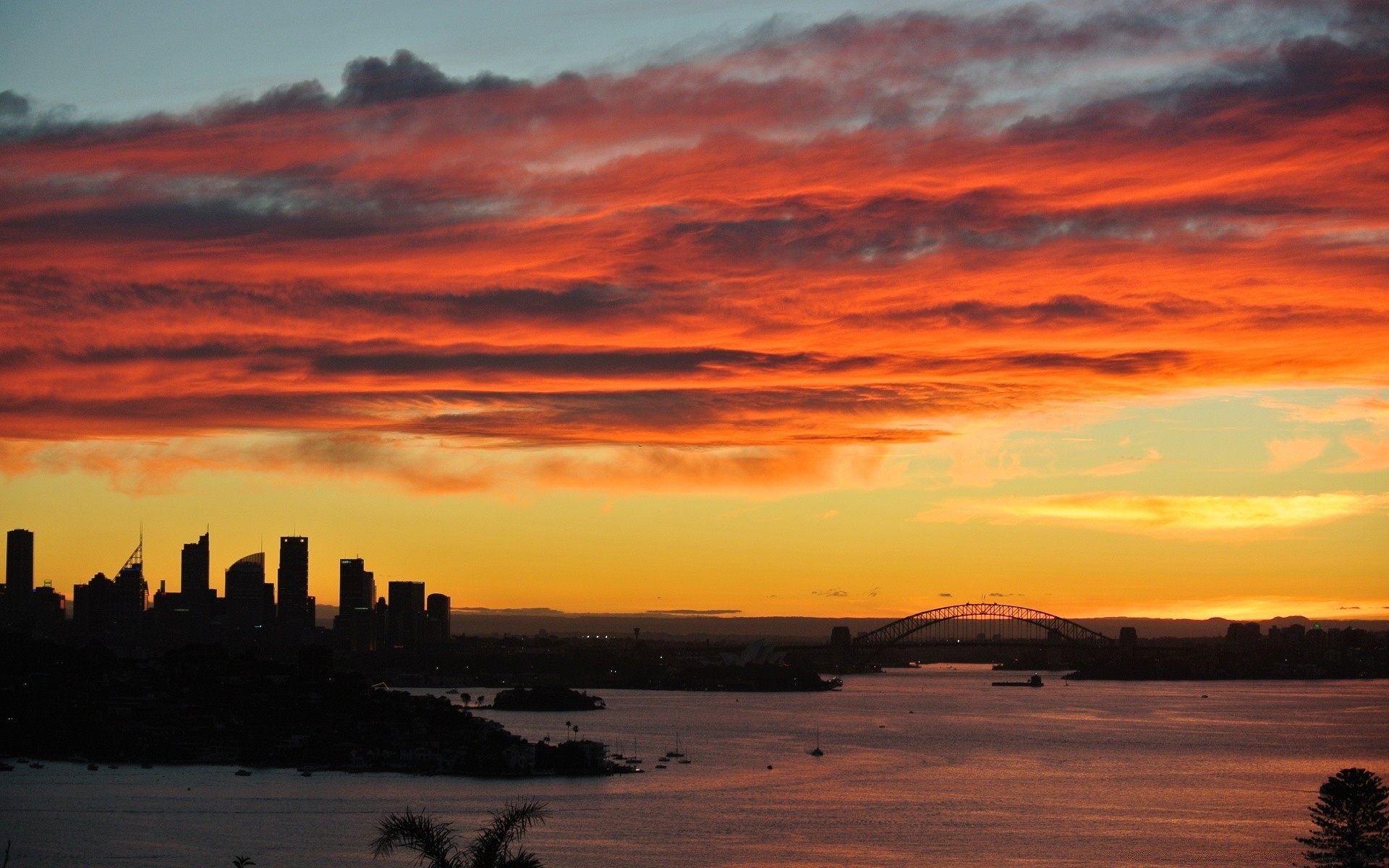 other city sunset dawn dusk evening water sun sky backlit sea beach travel outdoors