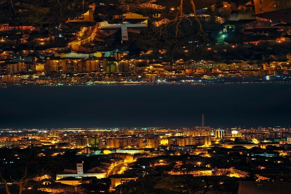 Visão noturna da cidade do alto