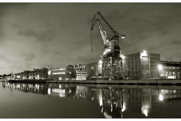 River. Urban development. Marine cranes