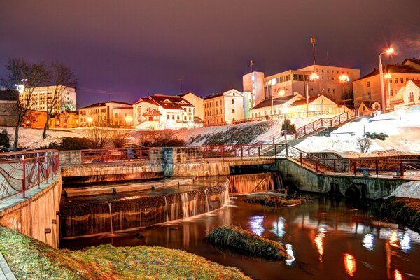 Winter dam in the evening with lighting