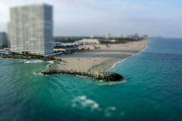 Beach on the ocean coast with blue water