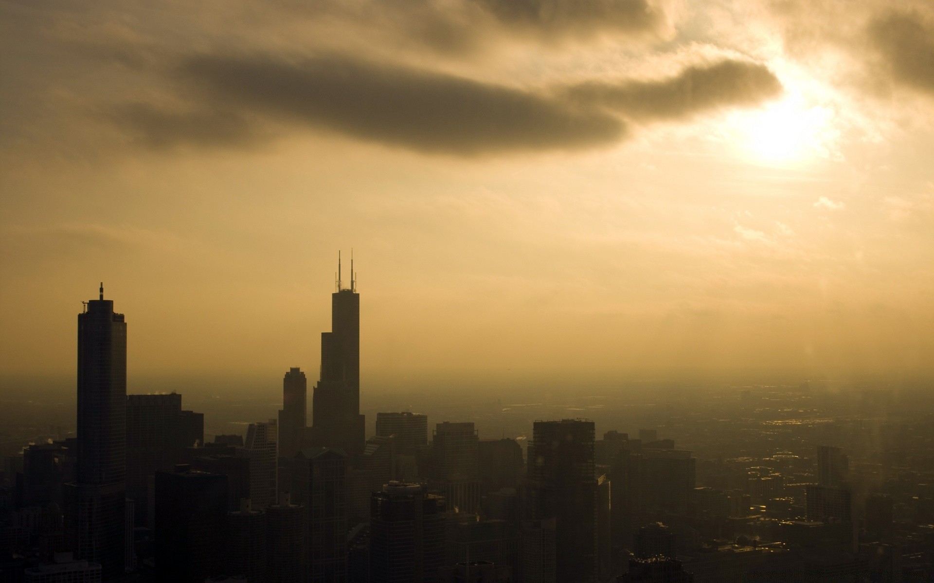 other city sunset city dawn skyline architecture sky travel skyscraper dusk evening downtown cityscape backlit fog moon outdoors building silhouette