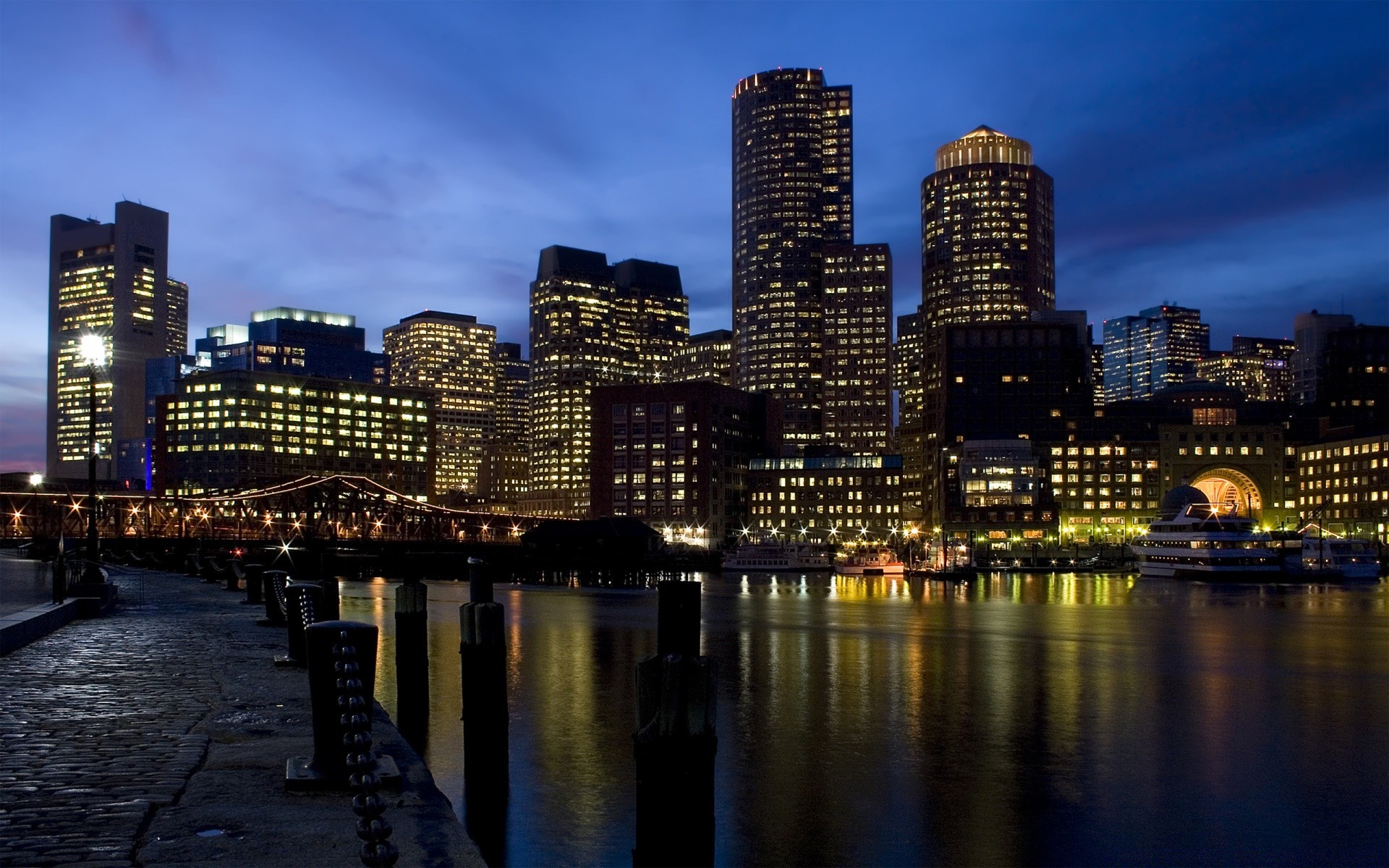 other city city skyline architecture cityscape skyscraper downtown building travel dusk river office waterfront sunset reflection urban water sky evening bridge