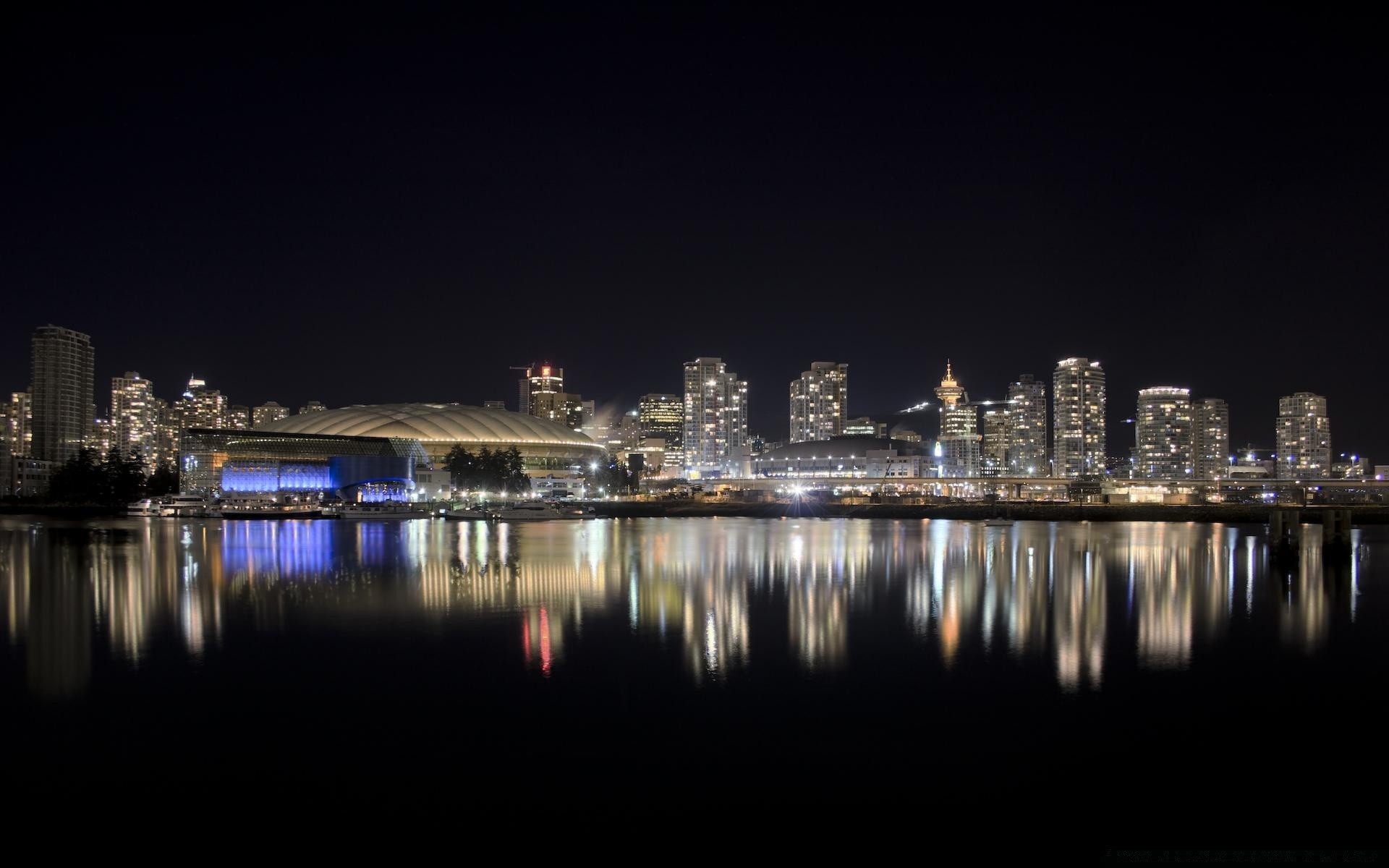 other city city skyline cityscape downtown architecture water reflection river travel sky sunset bridge skyscraper dusk evening building urban light waterfront harbor