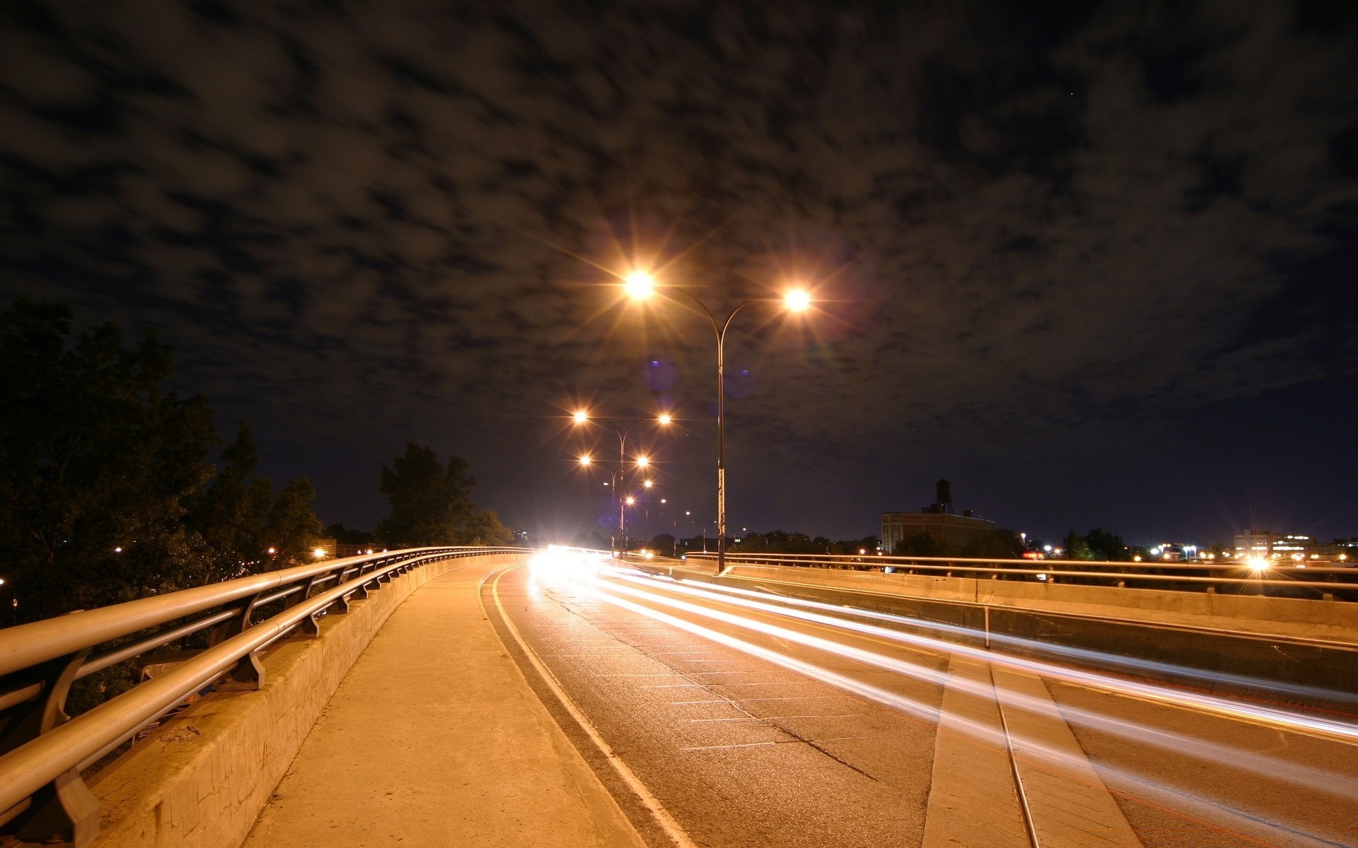 other city road street highway transportation system evening dusk blur sunset light travel traffic asphalt car guidance sky