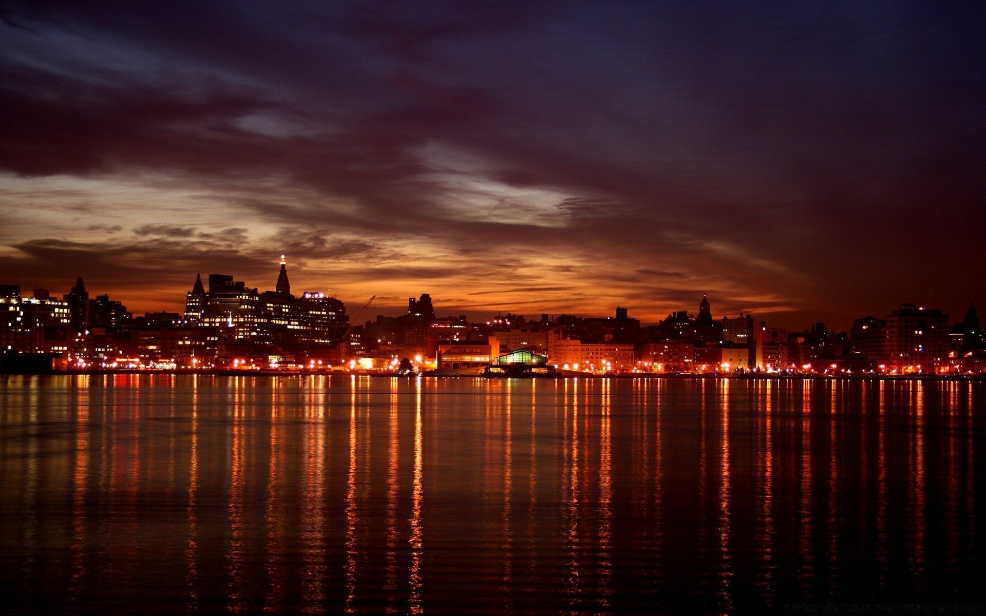 inne miasta zachód słońca wody miasto zmierzch wieczór świt niebo odbicie miasto skyline podróże rzeka most architektura morze molo centrum miasta port