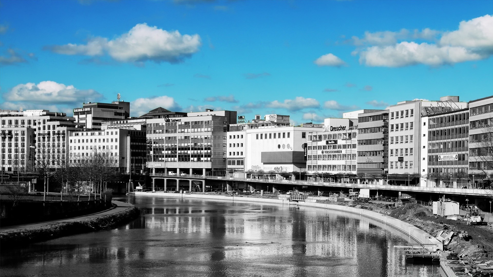 other city city water architecture building river reflection travel sky cityscape urban town modern horizontal outdoors house waterfront apartment bridge sight