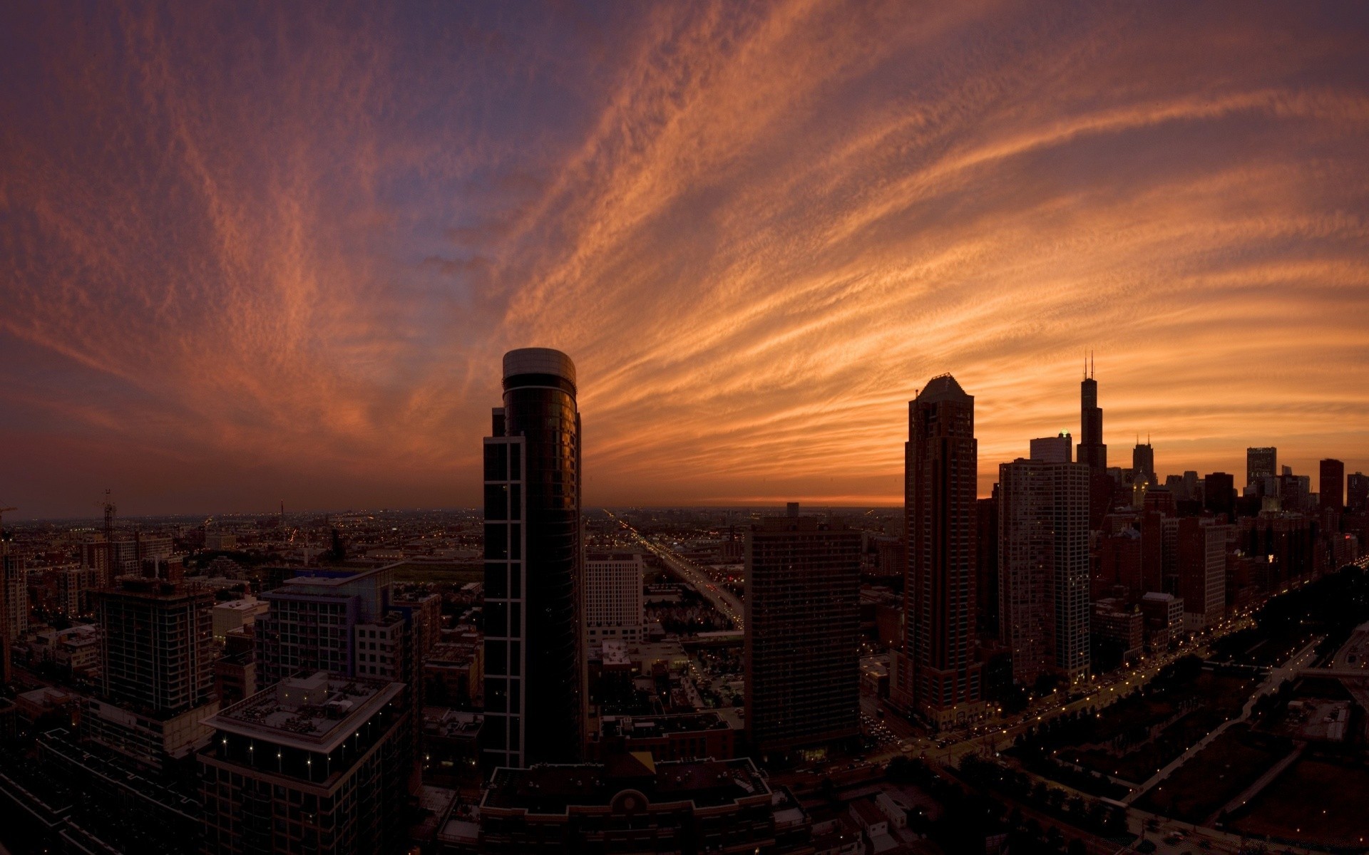 other city sunset city architecture dawn skyline travel evening dusk sky skyscraper cityscape downtown building light outdoors tower street urban