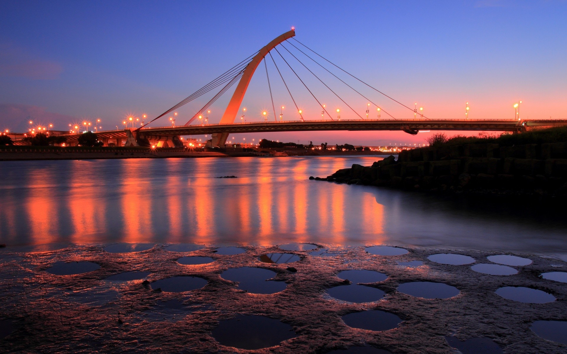 other city bridge water city sunset river architecture travel evening sea urban dusk transportation system reflection suspension bridge ocean