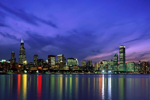 Megapolis lights reflection skyscrapers night