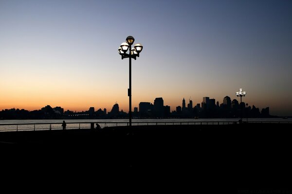 Evening embankment of the big city