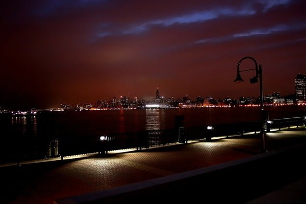 View of the city on the other side from the night embankment