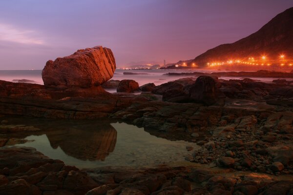 Puesta de sol paisaje reflexión piedra agua