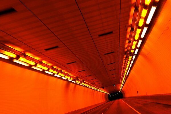 Red tunnel and burning lamps