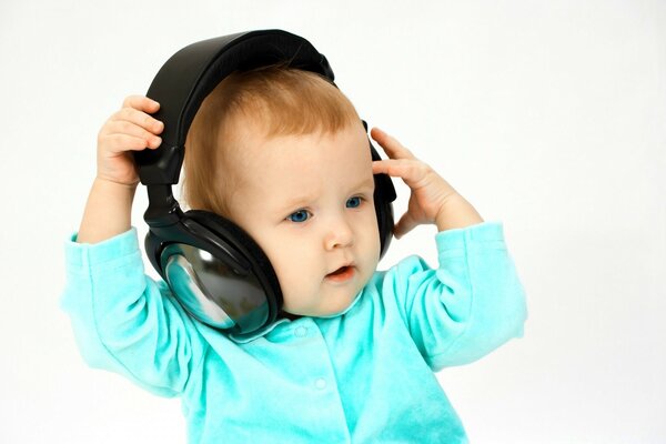 Cute baby listening to music